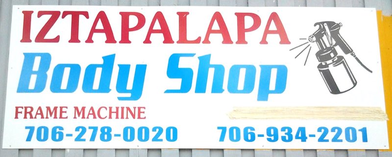 Iztapalapa Body Shop sign
